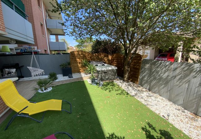Appartement à Blagnac - Le Jungle : T2 avec Jardin et Jacuzzi Appartement à Blagnac - Le Jungle : T2 avec Jardin et Jacuzzi