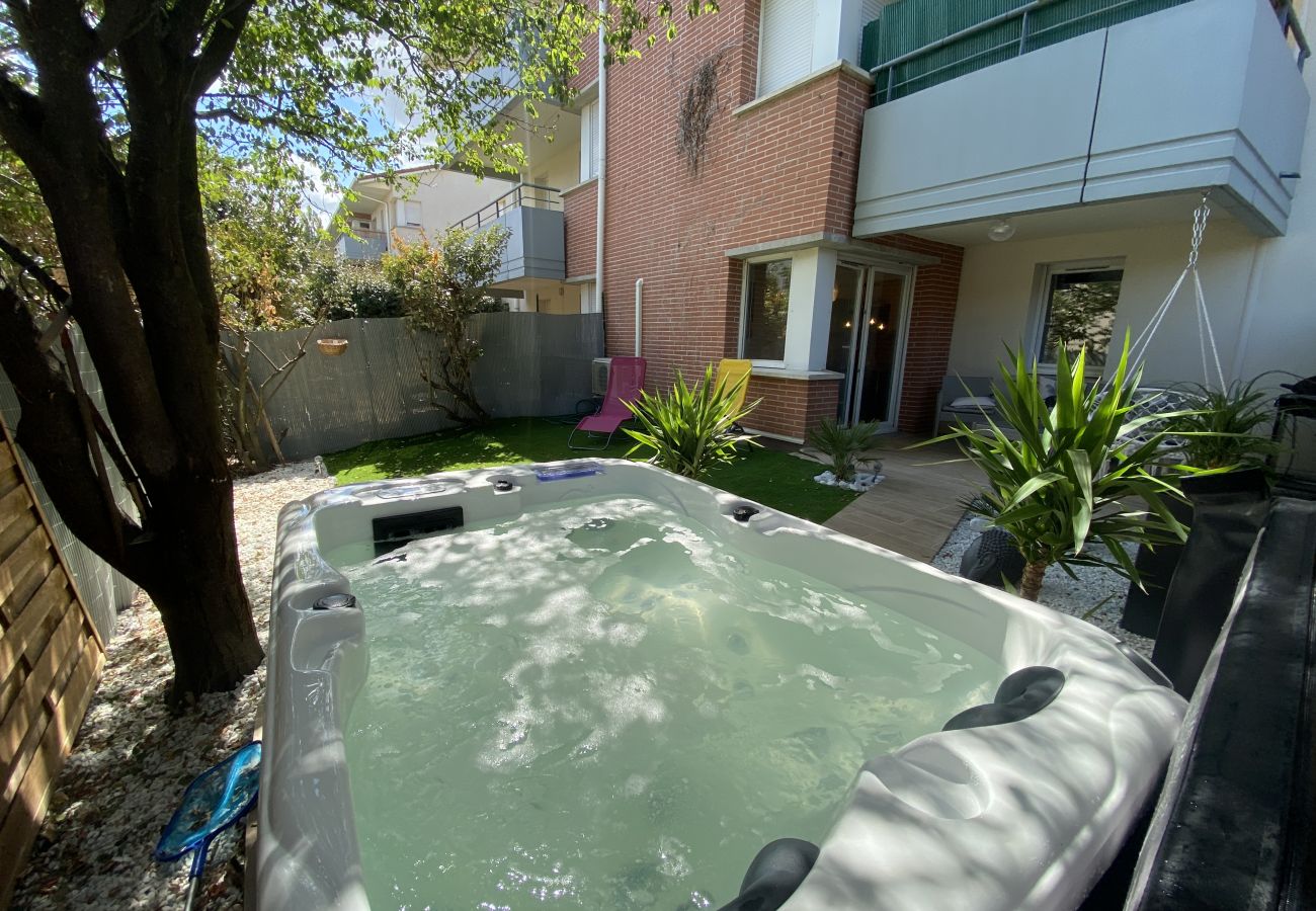 Appartement à Blagnac - Le Jungle : T2 avec Jardin et Jacuzzi