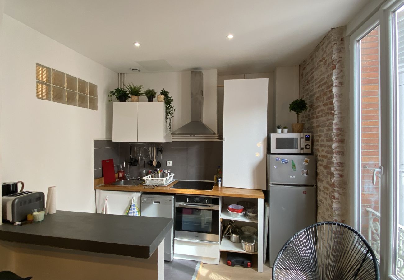 Appartement à Toulouse - Le Concorde : T2 mur de brique proche Gare