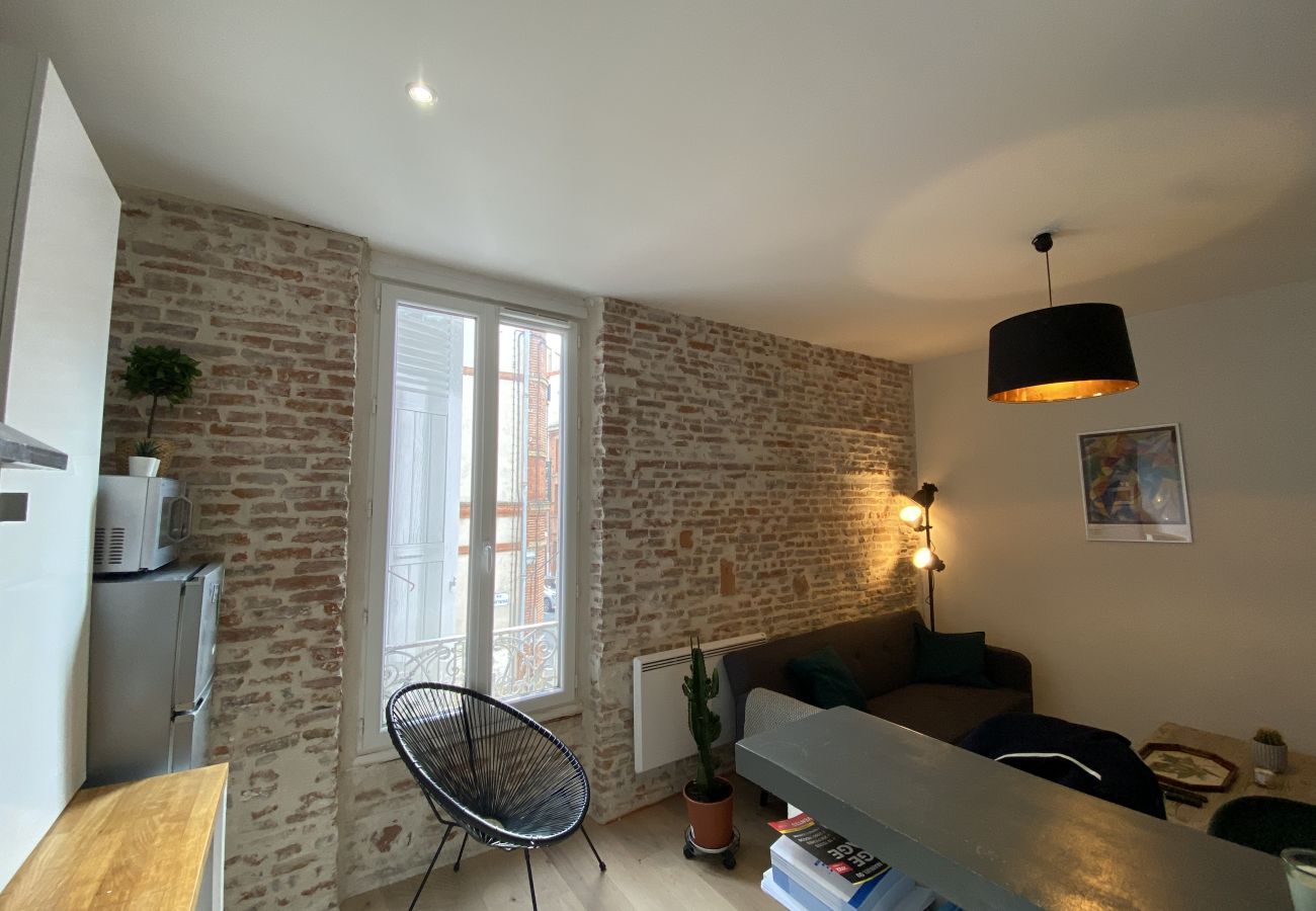 Appartement à Toulouse - Le Concorde : T2 mur de brique proche Gare